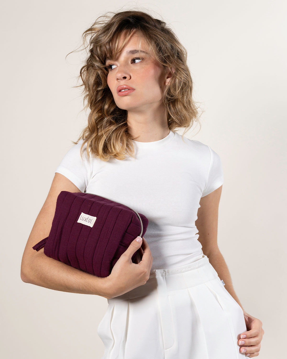 Trousse matelassée violette