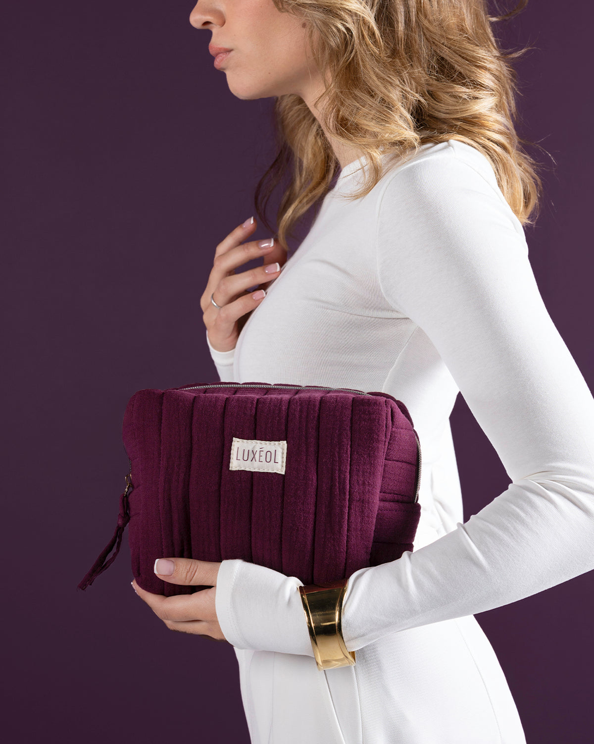 Trousse matelassée violette